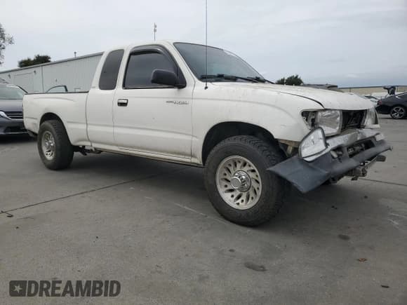 ✅ 1999 Toyota Tacoma • VIN: 4TAVL52N2XZ501492 • Lot: 81868195. Listed on Copart with 288,183 mi. Free auction sales archive from the USA and detailed vehicle history report at DreamBid. Image 4.