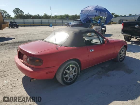 ✅ 1994 Mazda MX-5 Miata • VIN: JM1NA3535R0507190 • Lot: 66940085. Listed on Copart with 86,412 mi. Free auction sales archive from the USA and detailed vehicle history report at DreamBid. Image 3.