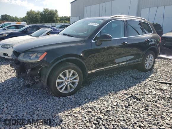 ✅ 2013 Volkswagen Touareg Exec • VIN: WVGEF9BP6DD008164 • Lot: 57117945. Listed on Copart with 8,310 mi. Free auction sales archive from the USA and detailed vehicle history report at DreamBid. Image 1.