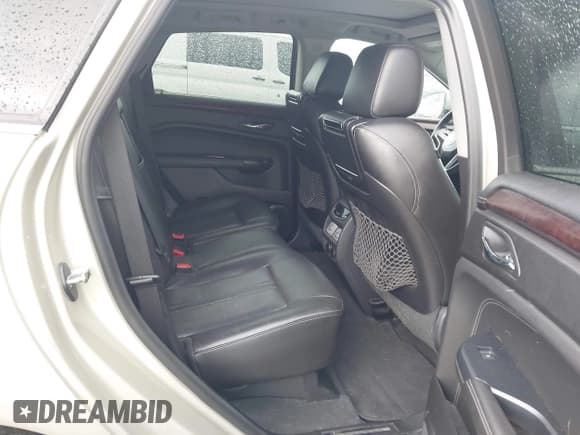 ✅ 2013 Cadillac SRX Premium Collection • VIN: 3GYFNJE38DS602125 • Лот: 43830462. Опубликован ранее на IAAI с пробегом 93 849 миль. Бесплатный доступ к архиву аукционных продаж из США и подробный отчёт об истории автомобиля на DreamBid. Изображение 8.