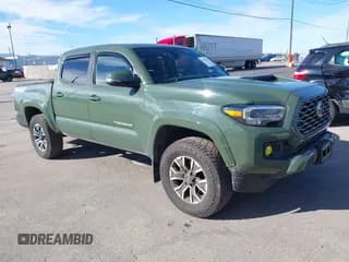 ✅ 2021 Toyota Tacoma SR • VIN: 3TYCZ5AN2MT023832 • Lot: 43542339. Listed on IAAI with 80,341 mi. Free auction sales archive from the USA and detailed vehicle history report at DreamBid. Image 1.