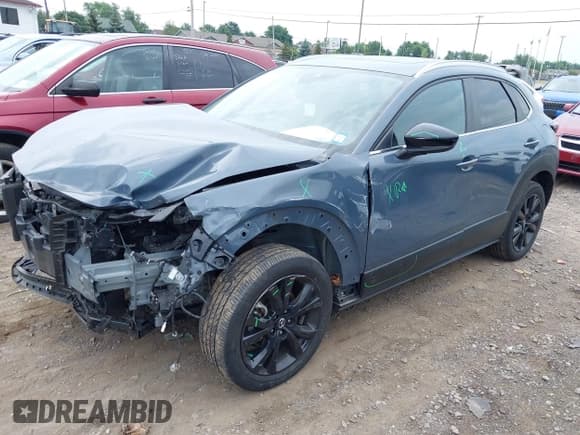 ✅ 2022 Mazda CX-30 S Carbon Edition • VIN: 3MVDMBCL7NM434765 • Lot: 42689789. Listed on IAAI with 27,767 mi. Free auction sales archive from the USA and detailed vehicle history report at DreamBid. Image 17.