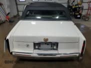 ✅ 1992 Cadillac DeVille • VIN: 1G6CD53B9N4210496 • Lot: 85325204. Listed on Copart with 148,360 mi. Free auction sales archive from the USA and detailed vehicle history report at DreamBid. Image 6.