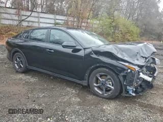 ✅ 2025 Kia K4 LXS • VIN: 3KPFT4DE4SE005260 • Лот: 93838505. Опубликован ранее на Copart с пробегом 24 031 миль. Бесплатный доступ к архиву аукционных продаж из США и подробный отчёт об истории автомобиля на DreamBid. Изображение 4.