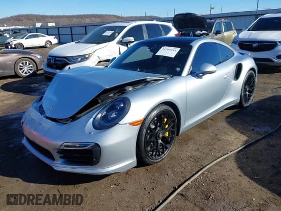 ✅ 2016 Porsche 911 Turbo S • VIN: WP0AD2A93GS166450 • Lot: 41301144. Wystawiony na IAAI z przebiegiem 23 420 mil. Bezpłatny archiwum sprzedaży aukcyjnych z USA i szczegółowy raport historii pojazdu na DreamBid. Zdjęcie 2.