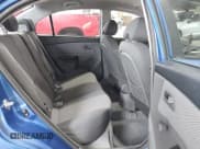 ✅ 2010 Kia Rio LX • VIN: KNADH4A37A6652068 • Lot: 42985384. Listed on IAAI with 72,837 mi. Free auction sales archive from the USA and detailed vehicle history report at DreamBid. Image 8.