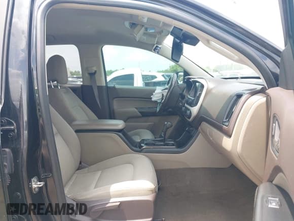 ✅ 2015 GMC Canyon 2WD SLE • VIN: 1GTG5BE3XF1226497 • Лот: 42106960. Опубликован ранее на IAAI с пробегом 97 360 миль. Бесплатный доступ к архиву аукционных продаж из США и подробный отчёт об истории автомобиля на DreamBid. Изображение 5.