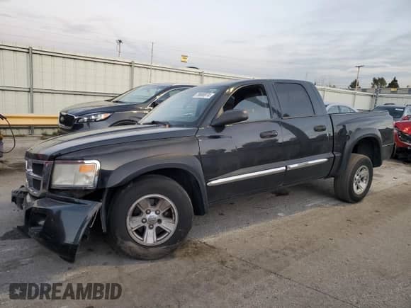 2008 Dodge Dakota SLT with VIN 1D7HE48N58S536752, listed as a Copart auction lot 79686974 with 220,024 mi miles and Salvage title. Bid and sale history available at DreamBid. Image 1.
