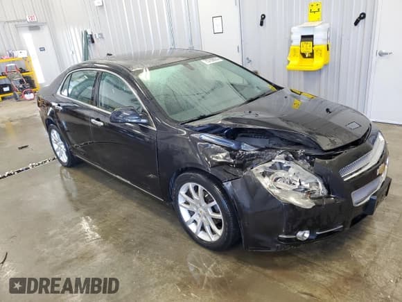 ✅ 2012 Chevrolet Malibu LTZ • VIN: 1G1ZG5E74CF126037 • Lot: 75759924. Listed on Copart with 189,644 mi. Free auction sales archive from the USA and detailed vehicle history report at DreamBid. Image 4.
