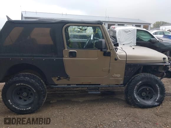 ✅ 2005 Jeep Wrangler Unlimited • VIN: 1J4FA44S15P301007 • Lot: 43384865. Listed on IAAI with 133,877 mi. Free auction sales archive from the USA and detailed vehicle history report at DreamBid. Image 13.