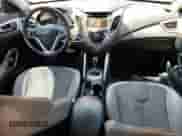 2012 Hyundai Veloster w/Gray Int с VIN KMHTC6AD1CU049872, выставлен на аукционе Copart как лот 70277225 с пробегом 164 243 миль миль и Списание • Salvage title. История ставок и продаж доступна на DreamBid. Изображение 8.