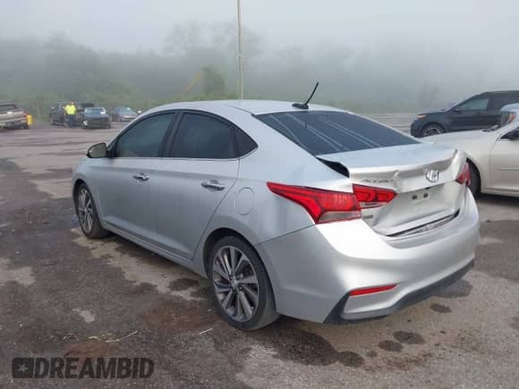 2018 Hyundai Accent Limited z VIN 3KPC34A35JE020712, wystawiony jako IAAI lot #42000295 z przebiegiem 101 956 mil mil oraz . Historia ofert i sprzedaży dostępna na DreamBid. Obrazek 3.