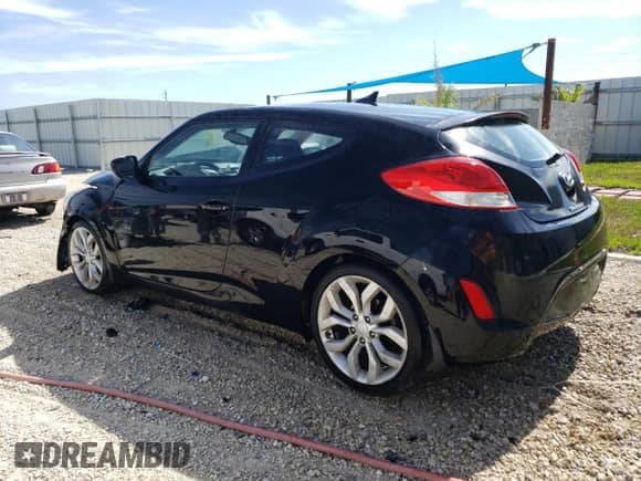 2013 Hyundai Veloster w/Gray Int с VIN KMHTC6AD4DU146811, выставлен на аукционе Copart как лот 64999524 с пробегом 71 496 миль миль и Списание • Salvage title. История ставок и продаж доступна на DreamBid. Изображение 2.
