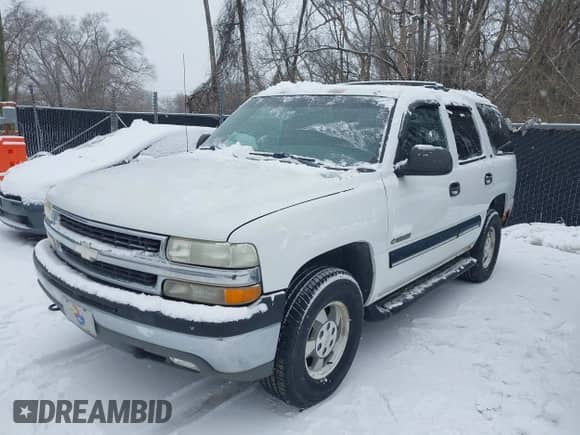 2001 Chevrolet Tahoe LT z VIN 1GNEK13T01J287838, wystawiony jako IAAI lot #41551502 z przebiegiem 145 730 mil mil oraz . Historia ofert i sprzedaży dostępna na DreamBid. Obrazek 2.