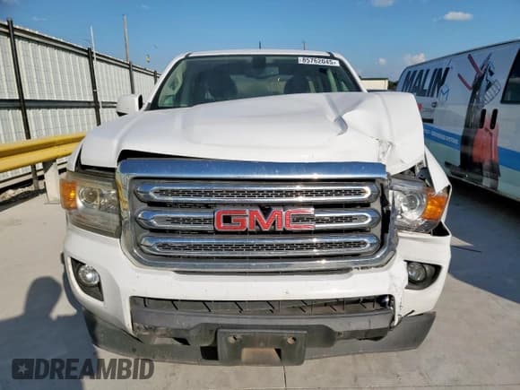 ✅ 2020 GMC Canyon 2WD SLE • VIN: 1GTG5CEN9L1182754 • Лот: 85762045. Опубликован ранее на Copart с пробегом 77 668 миль. Бесплатный доступ к архиву аукционных продаж из США и подробный отчёт об истории автомобиля на DreamBid. Изображение 5.