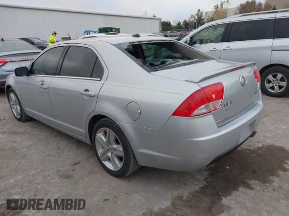 ✅ 2010 Mercury Milan • VIN: 3MEHM0HA1AR630467 • Lot: 43716801. Listed on IAAI with 192,186 mi. Free auction sales archive from the USA and detailed vehicle history report at DreamBid. Image 3.