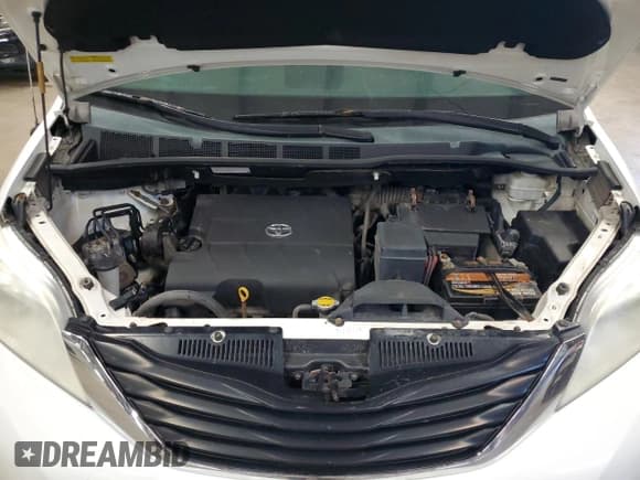 ✅ 2012 Toyota Sienna LE AAS • VIN: 5TDKK3DC8CS183318 • Lot: 81241035. Listed on Copart with 275,863 mi. Free auction sales archive from the USA and detailed vehicle history report at DreamBid. Image 12.