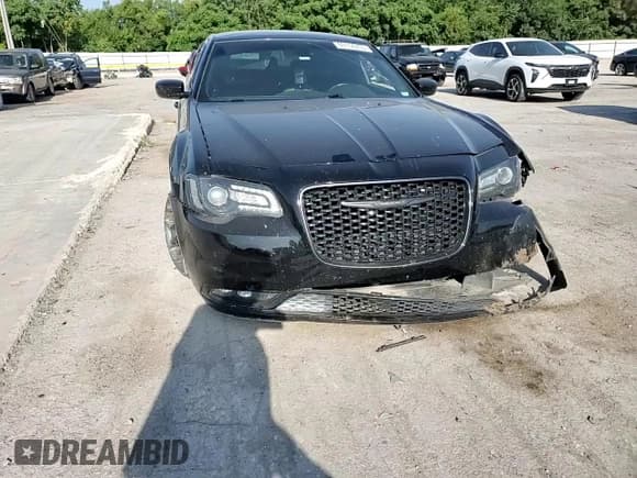 ✅ 2016 Chrysler 300 S • VIN: 2C3CCABT2GH156889 • Lot: 69154235. Listed on Copart with 106,727 mi. Free auction sales archive from the USA and detailed vehicle history report at DreamBid. Image 13.