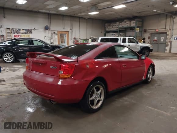✅ 2000 Toyota Celica GTS • VIN: JTDDY32T4Y0021318 • Lot: 41919875. Listed on IAAI with 244,249 mi. Free auction sales archive from the USA and detailed vehicle history report at DreamBid. Image 4.