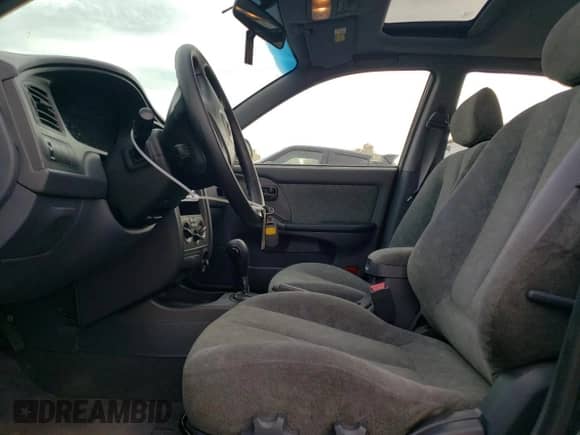 2003 Hyundai Elantra GLS с VIN KMHDN45D93U669804, выставлен на аукционе Copart как лот 79068184 с пробегом 66 490 миль миль и Списание • Salvage title. История ставок и продаж доступна на DreamBid. Изображение 7.