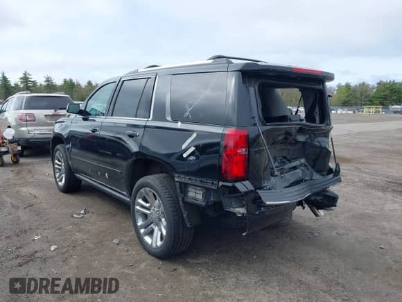 2020 Chevrolet Tahoe Premier z VIN 1GNSKCKJ4LR126699, wystawiony jako IAAI lot #39217949 z przebiegiem 83 245 mil mil oraz . Historia ofert i sprzedaży dostępna na DreamBid. Obrazek 3.