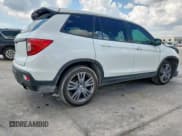 ✅ 2021 Honda Passport EX-L • VIN: 5FNYF7H57MB002751 • Lot: 69928005. Listed on Copart with 47,448 mi. Free auction sales archive from the USA and detailed vehicle history report at DreamBid. Image 3.