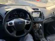 ✅ 2016 Ford Escape Titanium • VIN: 1FMCU0JX0GUA74577 • Lot: 80205944. Wystawiony na Copart z przebiegiem 104 781 mil. Bezpłatny archiwum sprzedaży aukcyjnych z USA i szczegółowy raport historii pojazdu na DreamBid. Zdjęcie 9.