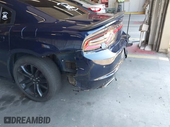 ✅ 2017 Dodge Charger SE • VIN: 2C3CDXBG9HH537465 • Lot: 43273802. Listed on IAAI with 105,564 mi. Free auction sales archive from the USA and detailed vehicle history report at DreamBid. Image 17.