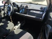 ✅ 2015 Smart fortwo Passion • VIN: WMEEJ3BA6FK796116 • Lot: 69946385. Listed on Copart with Not provided. Free auction sales archive from the USA and detailed vehicle history report at DreamBid. Image 8.