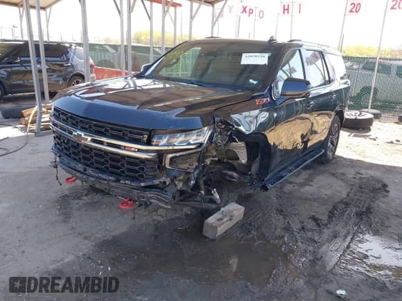 2022 Chevrolet Tahoe Z71 z VIN 1GNSKPKD1NR242429, wystawiony jako IAAI lot #42058520 z przebiegiem 63 699 mil mil oraz . Historia ofert i sprzedaży dostępna na DreamBid. Obrazek 19.