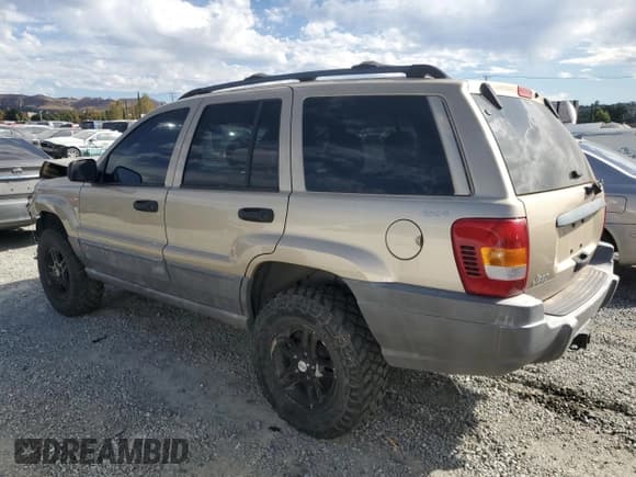 ✅ 1999 Jeep Grand Cherokee Laredo • VIN: 1J4GW58N0XC692998 • Lot: 86833535. Wystawiony na Copart z przebiegiem 130 532 mil. Bezpłatny archiwum sprzedaży aukcyjnych z USA i szczegółowy raport historii pojazdu na DreamBid. Zdjęcie 2.