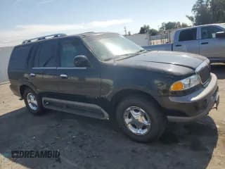 ✅ 1999 Lincoln Navigator • VIN: 5LMPU28L9XLJ13265 • Лот: 74402864. Опубликован ранее на Copart с пробегом 66 633 миль. Бесплатный доступ к архиву аукционных продаж из США и подробный отчёт об истории автомобиля на DreamBid. Изображение 4.