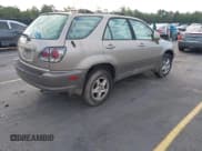 ✅ 2001 Lexus RX 300 • VIN: JTJHF10U910165733 • Lot: 43356064. Listed on IAAI with 300,451 mi. Free auction sales archive from the USA and detailed vehicle history report at DreamBid. Image 4.