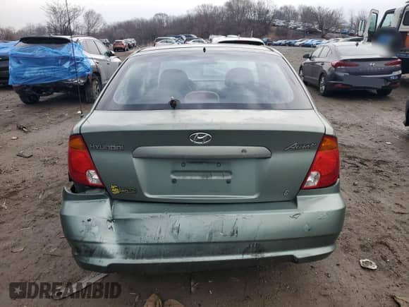 2003 Hyundai Accent GL с VIN KMHCG35C43U236043, выставлен на аукционе Copart как лот 87675835 с пробегом 76 232 миль миль и Списание • Salvage title. История ставок и продаж доступна на DreamBid. Изображение 6.