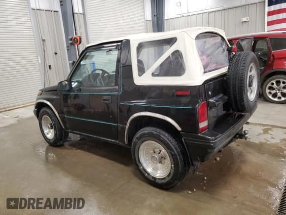 ✅ 1994 Geo Tracker • VIN: 2CNBJ18U5R6919981 • Lot: 69400435. Listed on Copart with 202,853 mi. Free auction sales archive from the USA and detailed vehicle history report at DreamBid. Image 2.