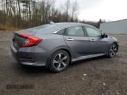 ✅ 2016 Honda Civic Touring • VIN: 2HGFC1F97GH114386 • Lot: 91595765. Listed on Copart with 238,268 mi. Free auction sales archive from the USA and detailed vehicle history report at DreamBid. Image 3.