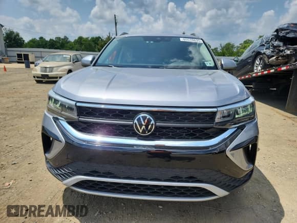 ✅ 2023 Volkswagen Taos SE • VIN: 3VVNX7B20PM343960 • Lot: 65516635. Wystawiony na Copart z przebiegiem 29 017 mil. Bezpłatny archiwum sprzedaży aukcyjnych z USA i szczegółowy raport historii pojazdu na DreamBid. Zdjęcie 5.