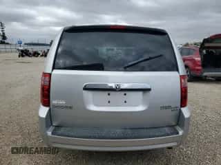 2010 Dodge Grand Caravan SXT z VIN 2D4RN5D10AR261437, wystawiony jako Copart lot #87382835 z przebiegiem 96 558 mil mil oraz Czysty tytuł • Clean title. Historia ofert i sprzedaży dostępna na DreamBid. Obrazek 6.