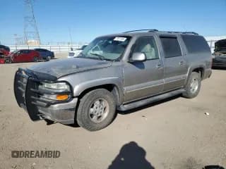 ✅ 2001 Chevrolet Suburban LS • VIN: 3GNEC16T81G219443 • Lot: 77371104. Wystawiony na Copart z przebiegiem 162 801 mil. Bezpłatny archiwum sprzedaży aukcyjnych z USA i szczegółowy raport historii pojazdu na DreamBid. Zdjęcie 1.