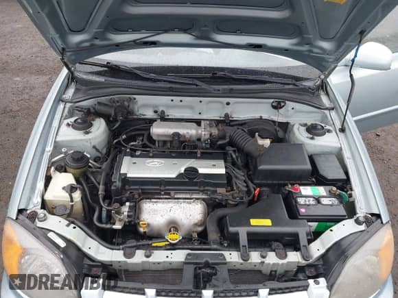 2003 Hyundai Accent GL z VIN KMHCG45C33U473080, wystawiony jako IAAI lot #41868765 z przebiegiem 57 478 mil mil oraz . Historia ofert i sprzedaży dostępna na DreamBid. Obrazek 10.