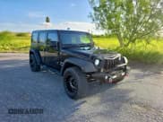 ✅ 2018 Jeep Wrangler Unlimited Sport S • VIN: 1C4HJWDG0JL899680 • Lot: 62428165. Listed on Copart with 162,218 mi. Free auction sales archive from the USA and detailed vehicle history report at DreamBid. Image 1.
