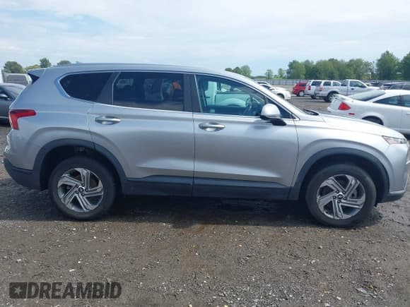 ✅ 2021 Hyundai Santa Fe SE • VIN: 5NMS1DAJ5MH329724 • Lot: 43245906. Listed on IAAI with 67,954 mi. Free auction sales archive from the USA and detailed vehicle history report at DreamBid. Image 13.