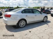 ✅ 2013 Volkswagen Jetta TDI w/Premium • VIN: 3VWLL7AJ4DM385387 • Lot: 63132695. Listed on Copart with 132,468 mi. Free auction sales archive from the USA and detailed vehicle history report at DreamBid. Image 3.