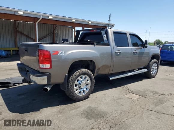 ✅ 2013 GMC Sierra 2500HD SLT • VIN: 1GT121E83DF154837 • Lot: 63439865. Listed on Copart with 241,191 mi. Free auction sales archive from the USA and detailed vehicle history report at DreamBid. Image 3.