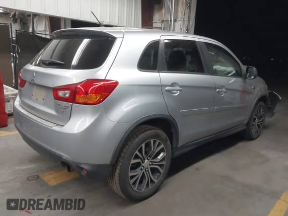2016 Mitsubishi Outlander SE with VIN JA4AP3AW3GZ043753, listed as a IAAI auction lot 42269009 with 79,297 mi miles and . Bid and sale history available at DreamBid. Image 4.