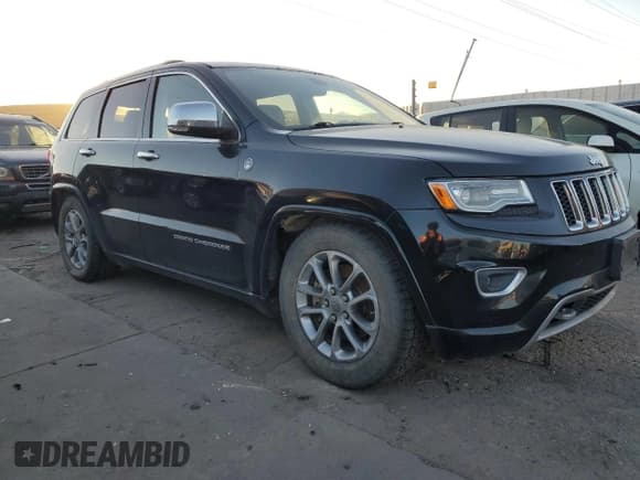 ✅ 2015 Jeep Grand Cherokee Overland • VIN: 1C4RJFCMXFC618455 • Lot: 80548554. Listed on Copart with 175,413 mi. Free auction sales archive from the USA and detailed vehicle history report at DreamBid. Image 4.