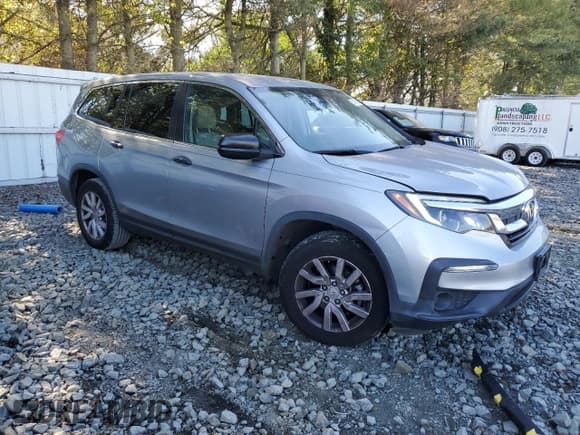 ✅ 2021 Honda Pilot LX • VIN: 5FNYF6H13MB020607 • Lot: 84836685. Listed on Copart with 77,381 mi. Free auction sales archive from the USA and detailed vehicle history report at DreamBid. Image 4.