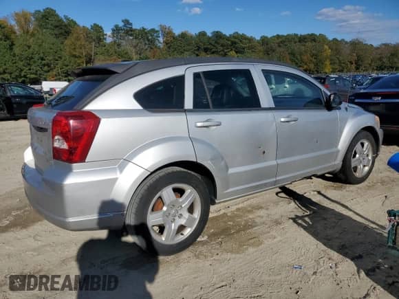 2009 Dodge Caliber SXT с VIN 1B3HB48A89D144274, выставлен на аукционе Copart как лот 87451625 с пробегом 175 456 миль миль и Списание • Salvage title. История ставок и продаж доступна на DreamBid. Изображение 3.