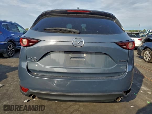 ✅ 2021 Mazda CX-5 Touring • VIN: JM3KFBCM2M0452532 • Lot: 94545745. Wystawiony na Copart z przebiegiem 39 281 mil. Bezpłatny archiwum sprzedaży aukcyjnych z USA i szczegółowy raport historii pojazdu na DreamBid. Zdjęcie 6.