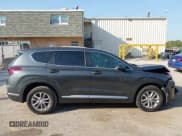 ✅ 2020 Hyundai Santa Fe SE • VIN: 5NMS23ADXLH260755 • Lot: 43335057. Wystawiony na IAAI z przebiegiem 150 088 mil. Bezpłatny archiwum sprzedaży aukcyjnych z USA i szczegółowy raport historii pojazdu na DreamBid. Zdjęcie 13.